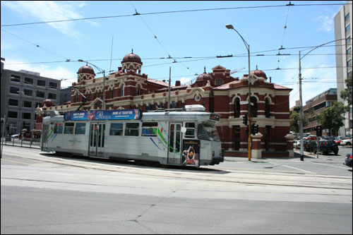 Melbourne tram with building in background